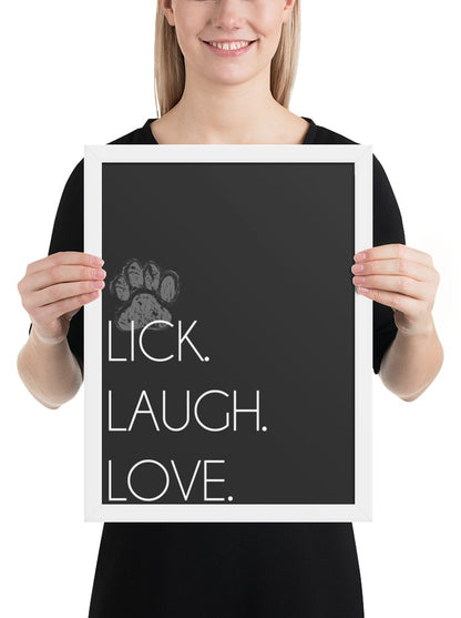 Lick. Love. Laugh. Quote Sign (Charcoal / White Frame): held up to show its size. [ks Background=Charcoal; Style=White Frame; kind=product]