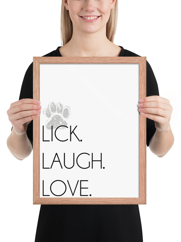 Lick. Love. Laugh. Quote Sign (White / Oak Frame): held up to show its size. [ks Background=White; Style=Oak Frame; kind=product]